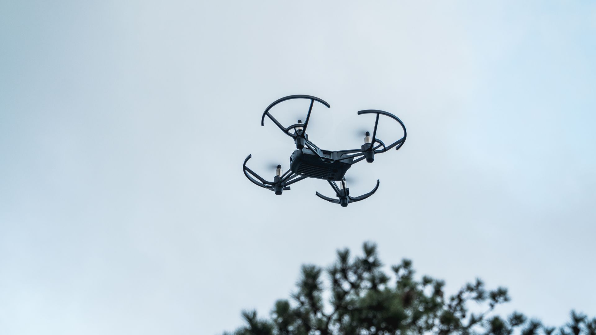 Professional camera drone in flight over the Florida coast