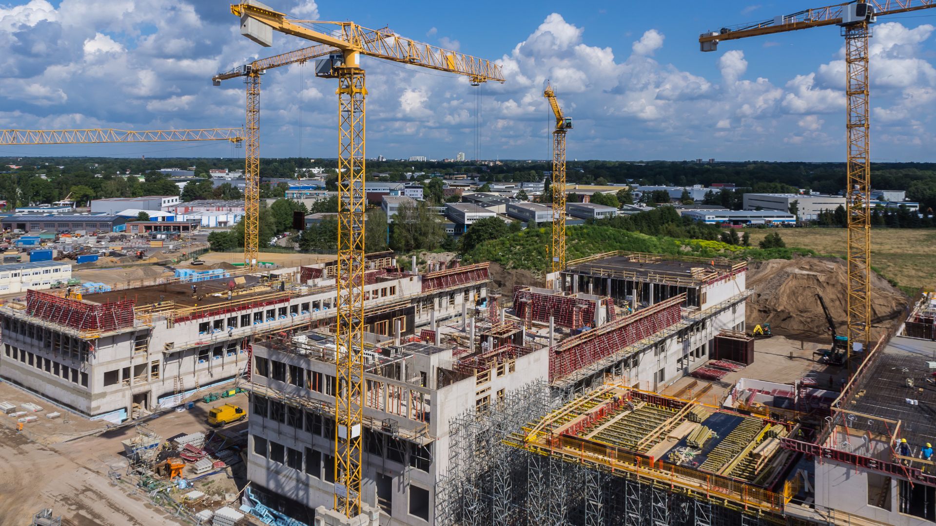 Aerial view of an active construction site with heavy equipment